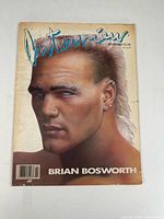 Front cover of the November 1987 Interview Magazine featuring a painted portrait of Brian Bosworth with a mohawk hair style, showing some creases and discoloration.