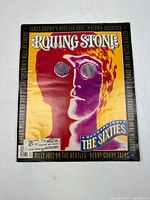 Front cover of Rolling Stone special issue with colorful portrait and text