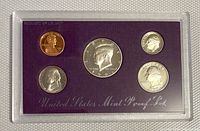 Obverse of five coins in sealed holder