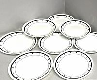 Eight Corelle side plates front view showing pattern