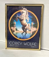 Front view showing unicorn print, frame, series text