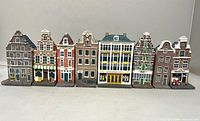 All eight miniature canal houses in a row