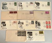 All twelve first day cover envelopes laid out for overview