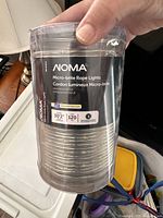 Photo of NOMA Micro-brite rope light package showing length as 30'2" and 120 warm white LED lights