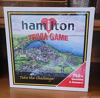 Front of the box showing city illustration and title with 750+ questions and answers.