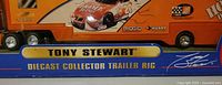 Close-up photo of the diecast collector trailer rig with Tony Stewart and NASCAR branding on trailer