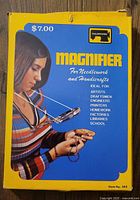 Front photo of vintage Tailorform magnifier box showing product name, user image, and product details in English