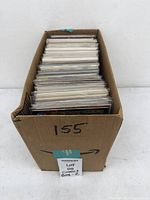 Box containing bagged comics front view