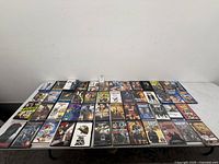 Full table view of all DVD cases laid flat