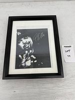 Framed signed photo full view