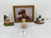 Group shot of framed print, vase, and two figurines