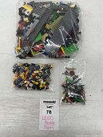 All three bags together on table with MaxSold lot tag visible