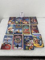 All 12 VHS tapes laid out on table