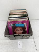 Front view of crate showing Reba McEntire album and other vinyl LPs