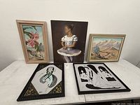 Group shot of five wall art pieces