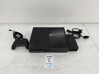 Console, controller, power brick and cords overview