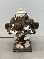 Front view of entire urn on square base