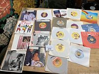 Full layout of all sixteen 7″ singles
