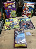 Overall view of sealed X-Men pack with four DC posters