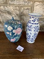 Front view of both porcelain pieces on table