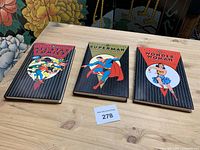 Front covers of the three DC Archive Editions books
