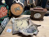 All three clocks grouped on tabletop