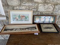 All four framed artworks together