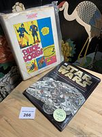 Both books on tabletop showing covers