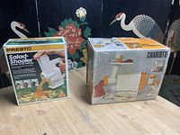 Both boxed appliances on table