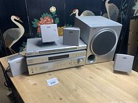 Overall view: receiver, DVD player, five speakers, subwoofer