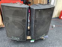 Front view of both Alesis speakers on dolly