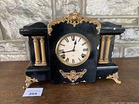 Front view showing entire clock and finish wear