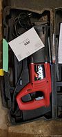 Skil reciprocating saw and its manual in the carrying case