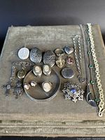 Overview of all items arranged on grey cloth