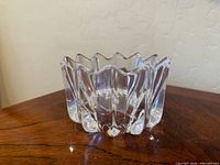 Side view of the clear lead crystal candy dish showing thick glass and wavy rim