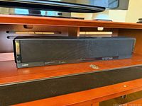 Front view of Yamaha YSP-3000 soundbar with black mesh grille and Yamaha branding.