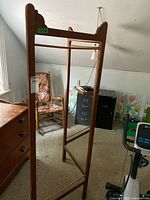 Full view of wooden room divider frame standing upright