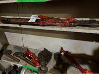 Shelf with bolt cutter, file and other hand tools