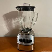 Full view of Oster blender with 8-cup glass jar and chrome plastic base
