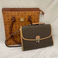 Both vintage leather bags displayed together showing size and style contrast: brown patterned tote and striped briefcase