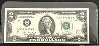 Front side of the 1976 US two-dollar bill showing the portrait of Thomas Jefferson and serial number G54543952A.