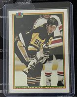 Front view of the 1990-1 Bowman Mario Lemieux hockey trading card showing him in Penguins uniform with the card number 204.