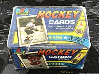 Factory sealed 1990 Bowman Hockey Premier Edition box showing front and side views with 264 card set noted