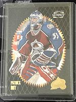 Front of 1995-96 Pinnacle Summit Patrick Roy Avalanche hockey card showing player image, team logo, and card details in good condition inside plastic sleeve.