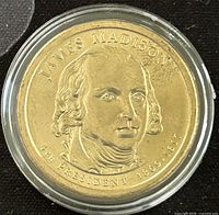 Obverse side showing James Madison portrait with inscriptions.