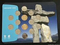 Fourteen coins displayed on a Vancouver 2010 background featuring 12 twenty-five cent coins and 2 twoonie coins.