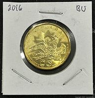 Front side of the 2016 Lucky Loonie coin showing the Olympic design with a loon, maple leaf, and year 2016.