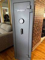 Full view of Liberty ProVault safe showing textured grey exterior and handle