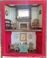 full view of two-story dollhouse shadow box with furnishings