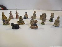 Group shot of all 14 Wade nursery rhyme figurines